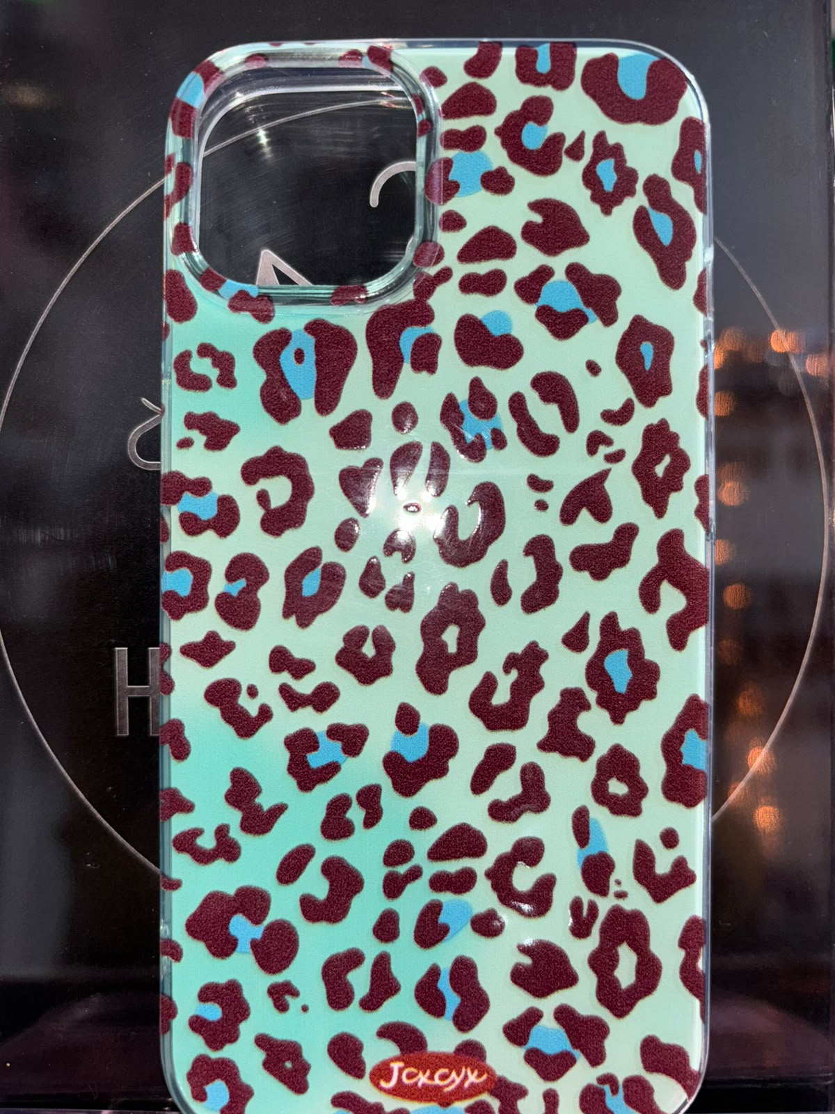 Funda leopardo sobre base menta para iPhone 13 y 14
