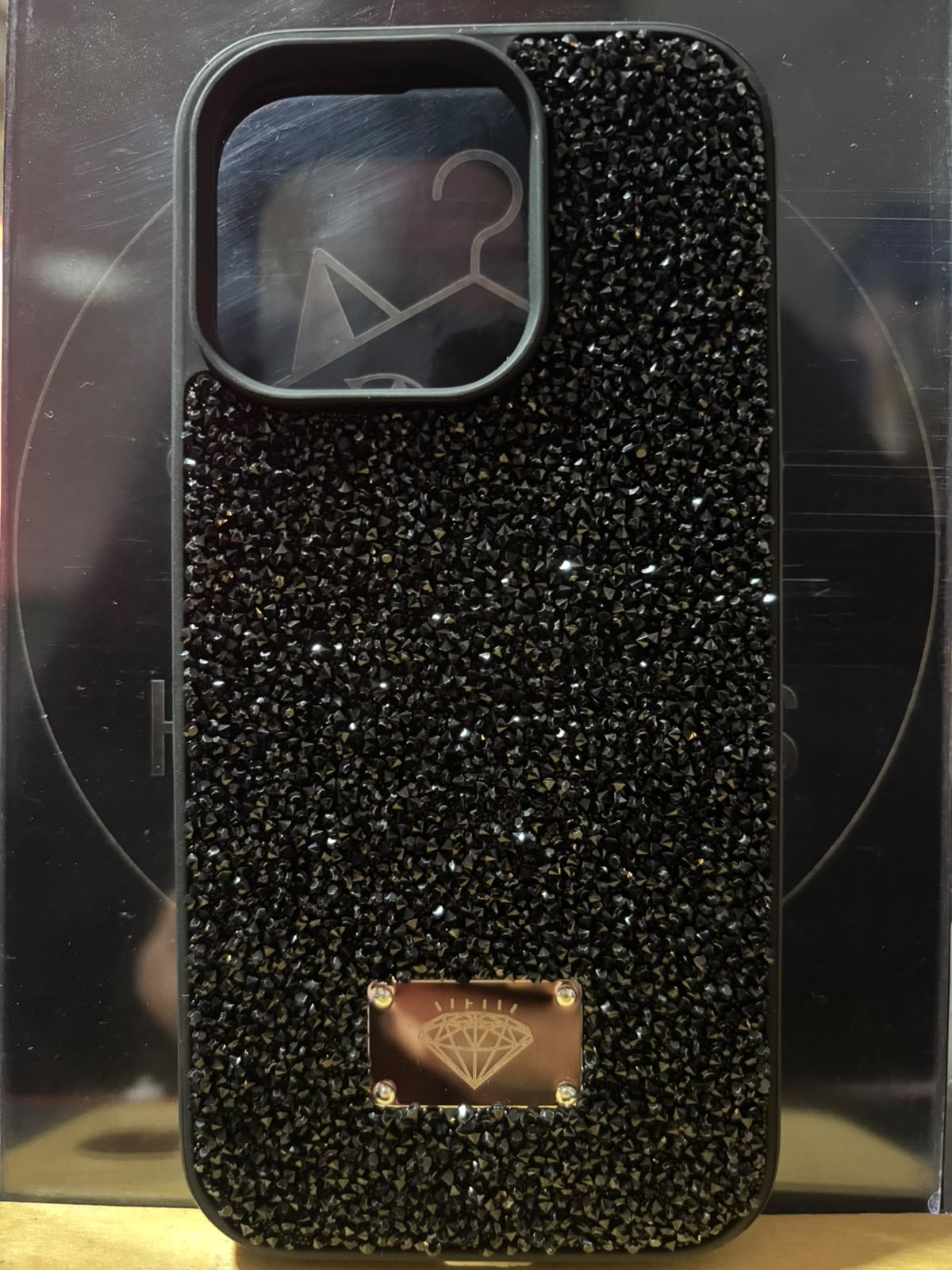 Funda de pedrería negra para iPhone 16 Pro